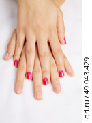Before and after woman nails treatment in Nail Salon. Стоковое фото, агентство Ingram Publishing / Фотобанк Лори