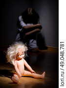 Crazy girl and plastic doll. Стоковое фото, агентство Ingram Publishing / Фотобанк Лори