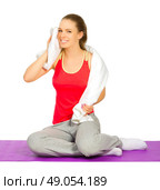 Young sporty girl doing gymnastic exercises isolated. Стоковое фото, агентство Ingram Publishing / Фотобанк Лори
