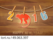 2016 with a goat on wooden background. Vector. Стоковая иллюстрация, агентство Ingram Publishing / Фотобанк Лори