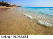 Morro Jable beach Fuerteventura at Canary Islands of Spain. Стоковое фото, агентство Ingram Publishing / Фотобанк Лори