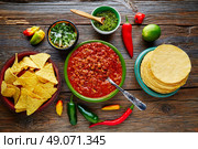 Chili with meat platillo Mexican food with sauces. Стоковое фото, агентство Ingram Publishing / Фотобанк Лори