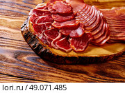 Tapas Iberico ham and lomo sausage from Spain. Стоковое фото, агентство Ingram Publishing / Фотобанк Лори