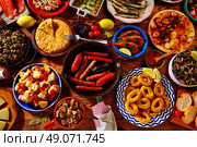 Tapas from spain varied mix of most popular tapa mediterranean food. Стоковое фото, агентство Ingram Publishing / Фотобанк Лори