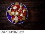 Tapas Patatas Bravas potatoe fries with tomato and mayonaise from Spain. Стоковое фото, агентство Ingram Publishing / Фотобанк Лори