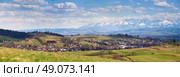 South Poland Panorama with snowy Tatra mountains in spring. Стоковое фото, агентство Ingram Publishing / Фотобанк Лори