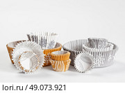 baking paper cups for cupcakes or muffins. Стоковое фото, агентство Ingram Publishing / Фотобанк Лори