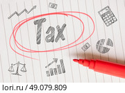 Tax memo note with sketches on linear paper. Стоковое фото, агентство Ingram Publishing / Фотобанк Лори