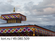Low angle view of a stupa, Paro, Bhutan. Стоковое фото, агентство Ingram Publishing / Фотобанк Лори