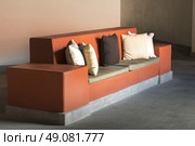 Couch with toss cushions in a hotel lobby, San Miguel de Allende, Guanajuato, Mexico. Стоковое фото, агентство Ingram Publishing / Фотобанк Лори
