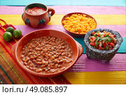 Frijoles mexican beans with rice and sauces nopal and pico de gallo. Стоковое фото, агентство Ingram Publishing / Фотобанк Лори