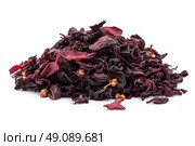 Roselle or Hibiscus tea pile isolated on a white background. Dry karkade flowers petals heap of dried herbal tea. Indian spices. Mockup of aromatic Fruit Red Tea, Dried Herbal Beverage. Carcade. Стоковое AI-изображение, AI-художник Марина Демидюк / Фотобанк Лори