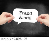 Fraud Alert written on a speechbubble. Стоковое фото, агентство Ingram Publishing / Фотобанк Лори