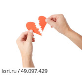 Broken heart on white background. Стоковое фото, агентство Ingram Publishing / Фотобанк Лори