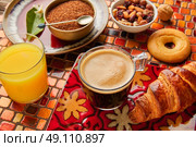 Breakfast continental with croissant coffe and orange juice. Стоковое фото, агентство Ingram Publishing / Фотобанк Лори