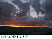 View of landscape against cloudy sky at sunset, Orvieto, Terni Province, Umbria, Italy. Стоковое фото, агентство Ingram Publishing / Фотобанк Лори