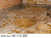 house under constraction with modern brick walls and holes for doors and windows. Стоковое фото, фотограф Feruza Tashmetova / Фотобанк Лори