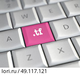 The .tf domain name on a keyboard key. Стоковое фото, агентство Ingram Publishing / Фотобанк Лори