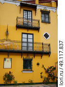 Seville Macarena barrio facades in Sevilla Spain. Стоковое фото, агентство Ingram Publishing / Фотобанк Лори