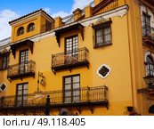 Seville Macarena barrio facades in Sevilla Spain. Стоковое фото, агентство Ingram Publishing / Фотобанк Лори