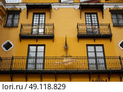 Seville Macarena barrio facades in Sevilla Spain. Стоковое фото, агентство Ingram Publishing / Фотобанк Лори