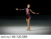 Young girl figure skater (on ice arena ver) Стоковое фото, агентство Ingram Publishing / Фотобанк Лори
