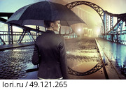 Elegant woman in the thunderstorm. Стоковое фото, агентство Ingram Publishing / Фотобанк Лори