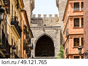 VALENCIA, SPAIN - JULY 21, 2016: Torres (Towers) de Quart A Pair Of Twin Towers That Were Part Of The Medieval Defense Wall Surrounding Old Town of Valencia City. Редакционное фото, агентство Ingram Publishing / Фотобанк Лори