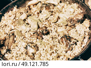 Traditional Valencian Paella With Rice And Chicken. Стоковое фото, агентство Ingram Publishing / Фотобанк Лори