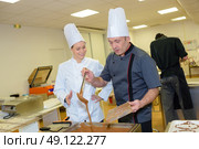 angry caucasian chef in uniform. Стоковое фото, агентство Ingram Publishing / Фотобанк Лори