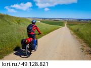 Biker at Via de la Plata way in Andalusia Spain to Santiago compostela. Стоковое фото, агентство Ingram Publishing / Фотобанк Лори