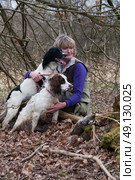 Portrait of a woman and her two spaniels. Стоковое фото, агентство Ingram Publishing / Фотобанк Лори
