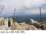 Fencing in the rugged Pyrenean mountains. Стоковое фото, агентство Ingram Publishing / Фотобанк Лори