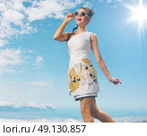 Charming woman taking a sunbath. Стоковое фото, агентство Ingram Publishing / Фотобанк Лори