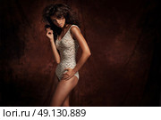 Sensual young woman wearing lingerie. Стоковое фото, агентство Ingram Publishing / Фотобанк Лори
