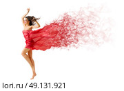Young woman on the wind isolated. Стоковое фото, агентство Ingram Publishing / Фотобанк Лори