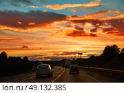 Sunset sky at AP-7 highway autovia road in Valencia at Mediterranean spain. Стоковое фото, агентство Ingram Publishing / Фотобанк Лори