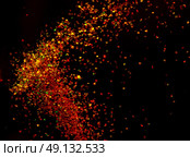 Orange sequins as a glimmering tornado. Стоковое фото, агентство Ingram Publishing / Фотобанк Лори