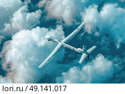 A sleek, white drone soars above fluffy, scattered clouds under a bright, clear sky, showcasing advanced aerial technology and impressive maneuverability. Стоковое AI-изображение, AI-художник Данила Большаков / Фотобанк Лори