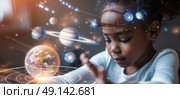 A child intently interacts with a virtual solar system, displaying various planets, while sitting indoors in daylight, showcasing a keen interest in astronomy. Стоковое AI-изображение, AI-художник Данила Большаков / Фотобанк Лори