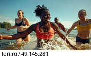 A group of women enjoying a playful time in the water, splashing and laughing together. Стоковое AI-изображение, AI-художник Данила Большаков / Фотобанк Лори