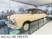 An impressive display of 1950s vintage car GAZ-12 ZIM showcased in a dedicated museum exhibit of Gorky Automobile Plant museum. Редакционное фото, фотограф Константин Григорьев / Фотобанк Лори