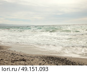 Sky with clouds and stormy waves in the sea. Стоковое фото, агентство Ingram Publishing / Фотобанк Лори