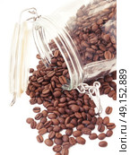 Heap of coffee beans from jar . Стоковое фото, агентство Ingram Publishing / Фотобанк Лори