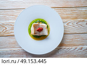 Atlantic hake over dried tomato ratatouille recipe. Стоковое фото, агентство Ingram Publishing / Фотобанк Лори