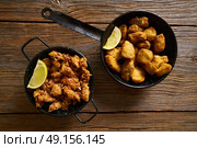 Tapas Adobo fried fish and puntilla skid breaded from Spain. Стоковое фото, агентство Ingram Publishing / Фотобанк Лори
