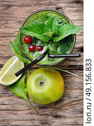 Freshly spinach smoothie. Blended green smoothie drink with spinach and. Стоковое фото, агентство Ingram Publishing / Фотобанк Лори
