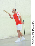 Man playing racket sport. Стоковое фото, агентство Ingram Publishing / Фотобанк Лори