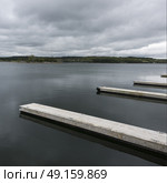 Scenic view of docks in sea, Guysborough, Nova Scotia, Canada. Стоковое фото, агентство Ingram Publishing / Фотобанк Лори