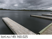 Scenic view of docks n sea, Guysborough, Nova Scotia, Canada. Стоковое фото, агентство Ingram Publishing / Фотобанк Лори